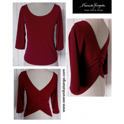 Top with ruffles at the back